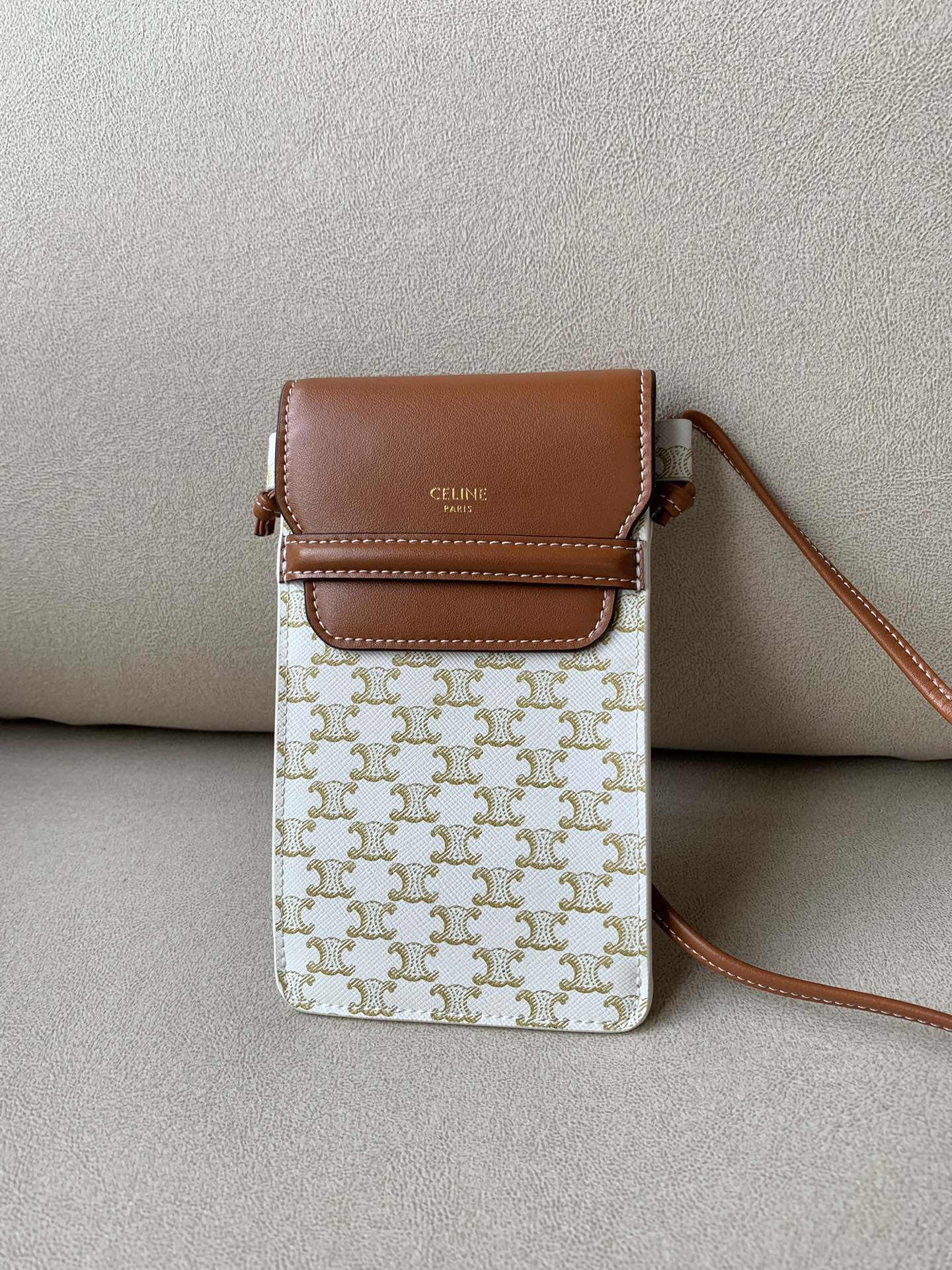 Celine Phone Pouch With Flap In Triomphe Canvas And Lambskin White/Tan For Women 7in/18cm 10G332CQD.01TA