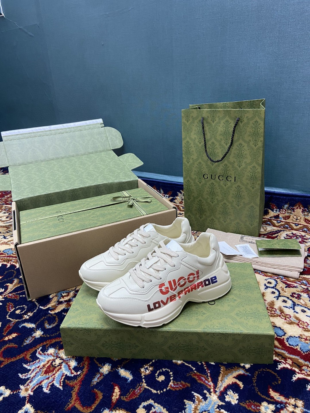 Gucci Men’s Rhyton Sneakers With Gucci Love Parade Red White Ivory For Men 524990‎