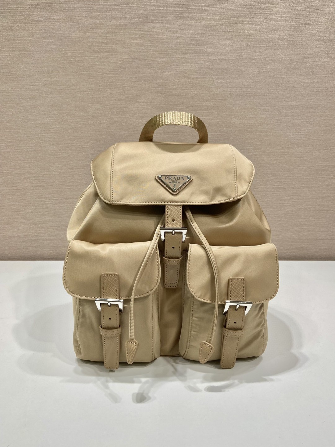 Prada Small Re-Nylon Backpack Beige For Women, Women’s Bags 11in/28cm 1BZ677_RV44_F0F24_V_OOO